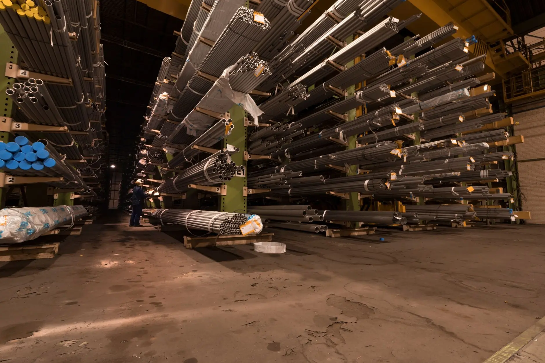 Steel pipes stacked in a warehouse